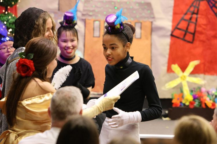 Student performing in play