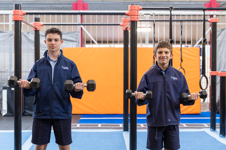 Students lifting weights